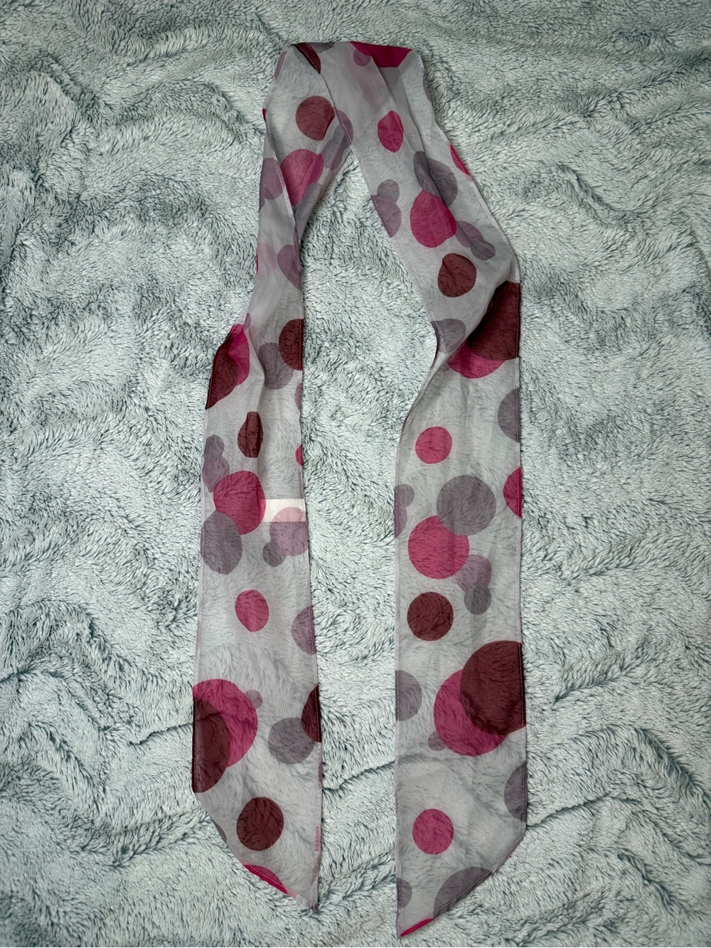 Vintage -style, semi-sheer scarf with a multi-tonal pink and red polka dots